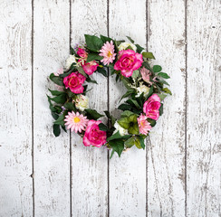 Flower wreath on vintage white background