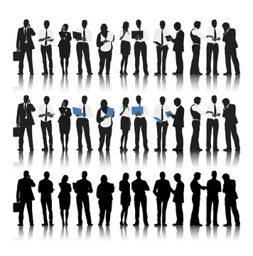 Silhouette of Business People in a Row Working