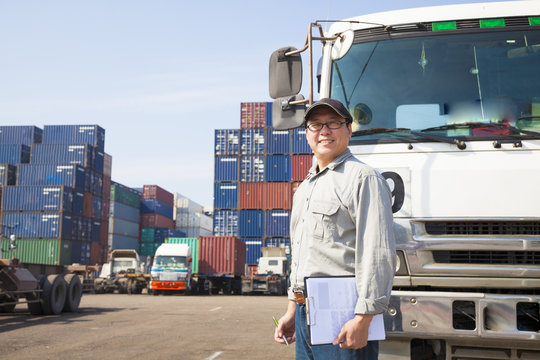 Happy Driver In Front Of Container Truck