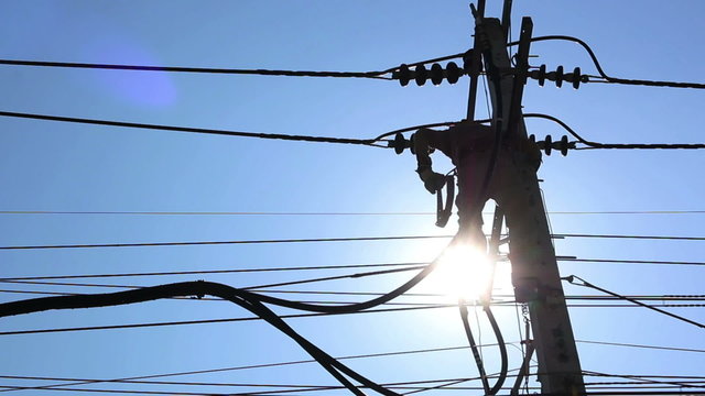 Silhouette of an electrician