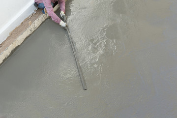 plasterer concrete cement worker plastering flooring