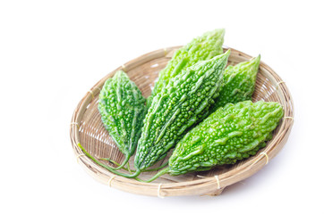 Bitter melon in weave basket.