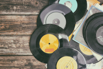 close up image of old records over wooden background , image is - obrazy, fototapety, plakaty