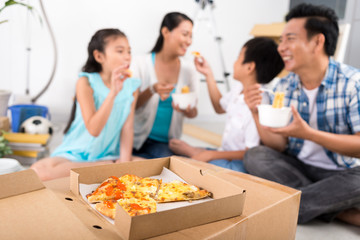Family eating pizza