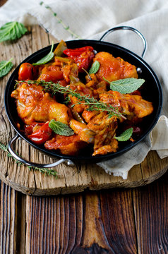 Chicken in tomato sauce with rosemary and thyme