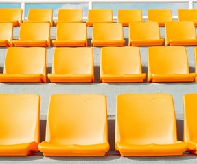 Rows of empty sports stadium seats