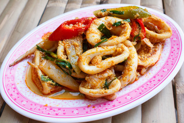 Fried squid in yellow curry powder.