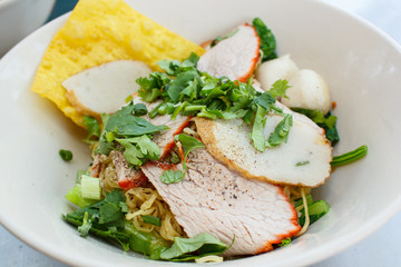 Wheat noodles with vegetables and meat.