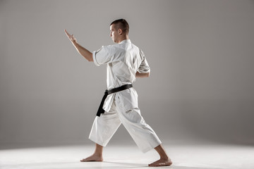 Man in white kimono training karate © master1305