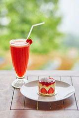 Strawberry cake and fresh juice