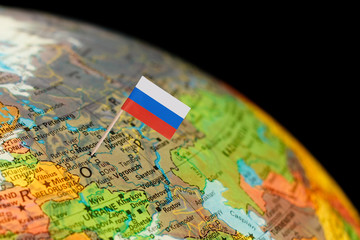 Globe map detail Russia with Russian Flag