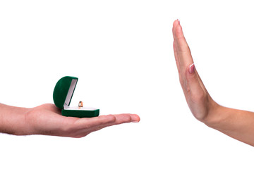 Hand giving box with a wedding ring