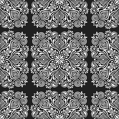 Seamless background with abstract ethnic pattern.