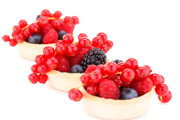 Fresh ripe berries in tartlets