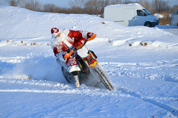 Santa Claus riding on a motorcycle turning MX