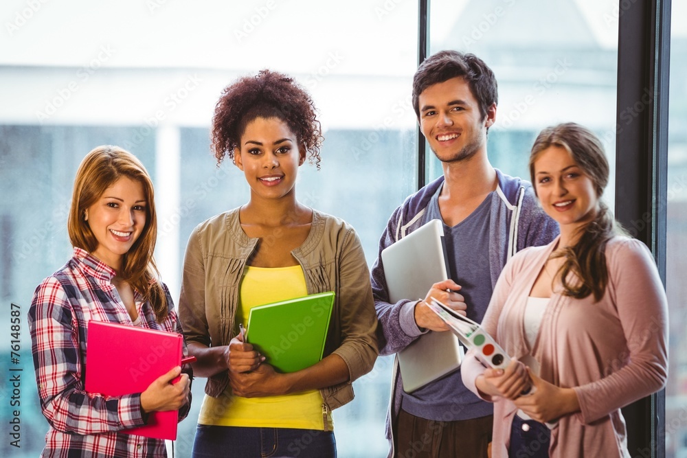 Aufkleber Four smiling classmates standing in front of the window