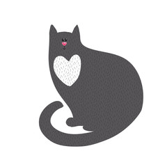 Cute black cat with white heart on chest.