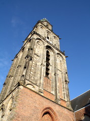 Fototapeta na wymiar Martini tower from 1482 against a blue sky in Groningen