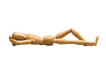 Wooden mannequin lying down