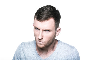 Obraz premium Very angry young man on whited