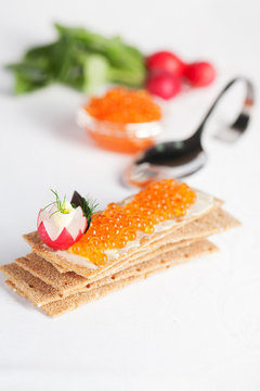 crispbread and red salmon caviar to supply the ideal figure