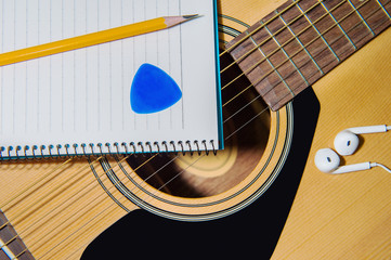 Guitar with pencil.