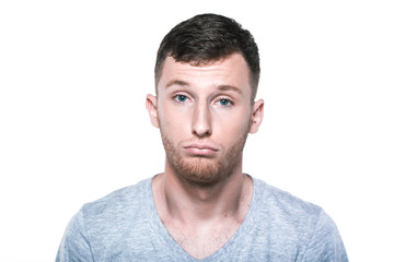 Fototapeta premium Sad and unhappy young man