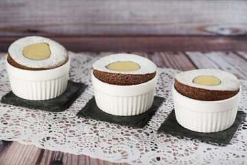 Chocolate souffle with vanilla liqueur sauce.