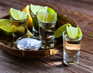 gold tequila with salt and lime