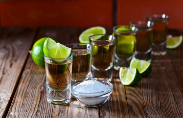 gold tequila with salt and lime
