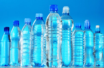 Composition with assorted plastic bottles of mineral water
