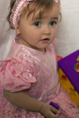 little girl in a pink dress