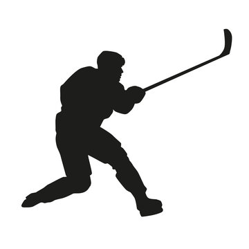 Hockey player shooting at the goal