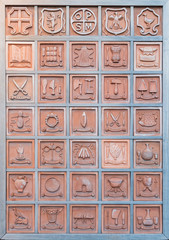 Bulletin board with terracotta professions..Orvieto Italy