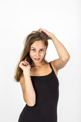 Naklejka premium smiling young beautiful girl with brown hair