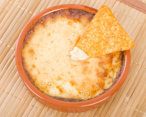 Baked Cheese - Melted cheese dip served with tortilla chips.
