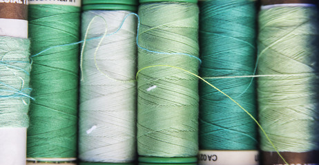 Green spools of sewing