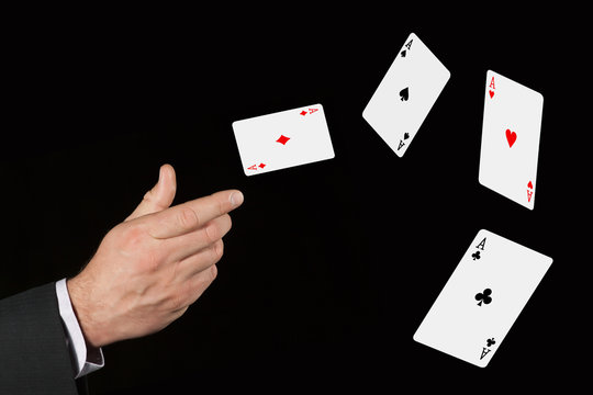 Flying cards is in the hand of lucky gambler