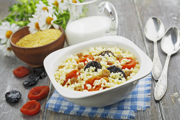 Millet porridge with dried apricots and prunes