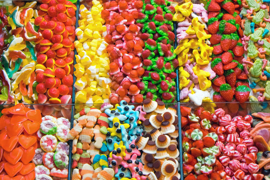 Market stall full of candys at the Boqueria in Barcelona