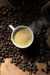 cup of coffee on the wooden table