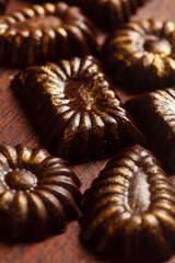 chocolate sweets with edible golden powdeer