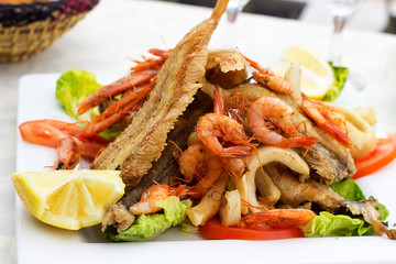 Tasty fish with seafood.