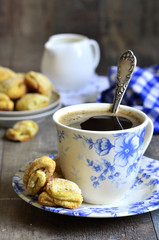 Cottage cheese biscuits with cup of coffee.