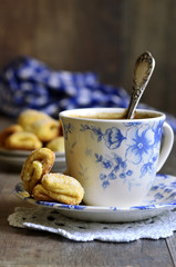 Cottage cheese biscuits with cup of coffee.