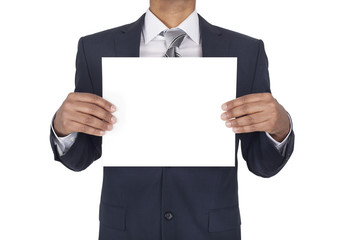 Black man wearing suit holding a blank board