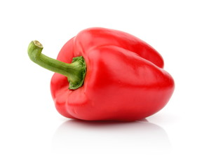 Single red pepper close-up view isolated white