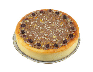 Cheesecake on plate isolated over white background.
