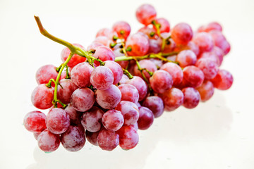 red grape isolated on white .
