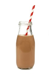 Chocolate milk with straw in a bottle isolated